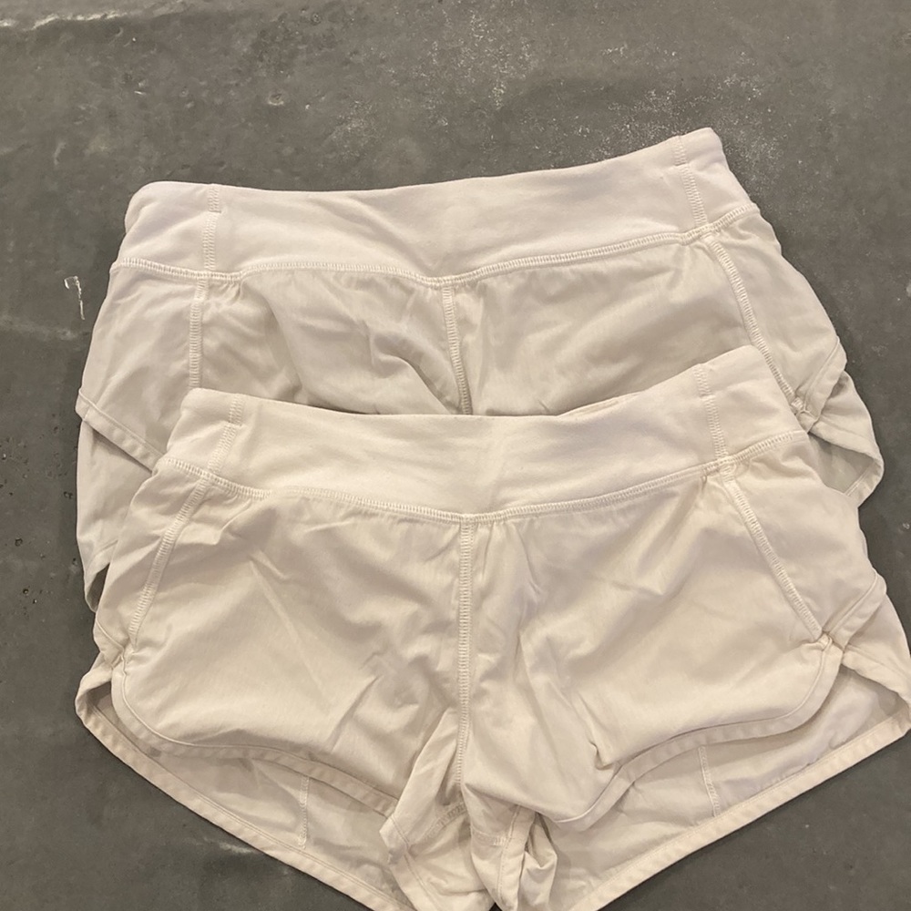 TWO PAIR Lululemon Ivivva white shorts 12 girls